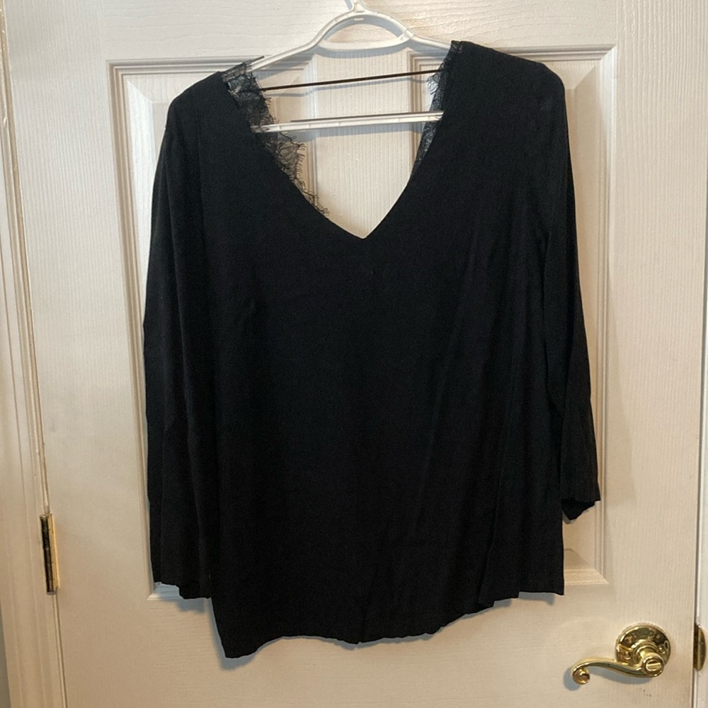 TK women’s XL black top with back lace design.